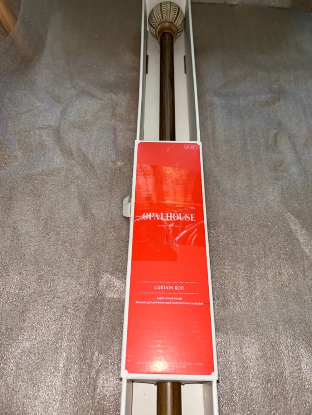 Opalhouse Jungalow Light Wood Curtain Rod with Textured Carved Round Finials.